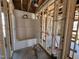 Unfinished bathroom with a white tub/shower installed and plumbing ready for fixtures, awaiting final touches at 8 W Emily Gardens Dr, Selma, NC 27577