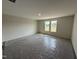 Bright bedroom featuring neutral wall color, natural light, and a serene atmosphere at 8 W Emily Gardens Dr, Selma, NC 27577