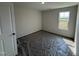Bright bedroom with neutral walls and a window offering natural light and simple design at 8 W Emily Gardens Dr, Selma, NC 27577