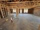 Spacious unfinished interior framing with insulation, ready for customization and finishing touches at 8 W Emily Gardens Dr, Selma, NC 27577
