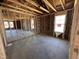 Spacious unfinished interior framing with insulation, ready for customization and finishing touches at 8 W Emily Gardens Dr, Selma, NC 27577