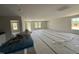 Expansive living room with a view of the kitchen and backyard at 8 W Emily Gardens Dr, Selma, NC 27577