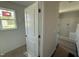 Bathroom featuring a walk-in shower, window, and built-in shelving at 82 W Emily Gardens Dr, Selma, NC 27576
