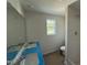 Bathroom featuring double sinks, and a window providing natural light at 82 W Emily Gardens Dr, Selma, NC 27576