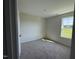 Bedroom featuring carpet floors, fresh paint, and natural light at 82 W Emily Gardens Dr, Selma, NC 27576
