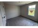 Cozy bedroom featuring a window, perfect for enjoying scenic views and natural light at 82 W Emily Gardens Dr, Selma, NC 27576