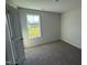 Bedroom featuring carpet floors, fresh paint, and natural light at 82 W Emily Gardens Dr, Selma, NC 27576