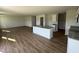 Spacious open kitchen with granite countertops, stainless appliances, island and modern finishes at 82 W Emily Gardens Dr, Selma, NC 27576