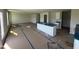 Modern kitchen with central island, and stylish cabinetry offers a spacious design at 82 W Emily Gardens Dr, Selma, NC 27576