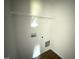 Convenient laundry area with built-in shelving, hookups, and easy access at 82 W Emily Gardens Dr, Selma, NC 27576
