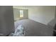 Spacious living room with plush carpet, neutral paint, and ample natural light at 82 W Emily Gardens Dr, Selma, NC 27576