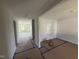 Bright and airy living room featuring neutral paint and ample natural light at 82 W Emily Gardens Dr, Selma, NC 27576
