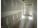 Unfinished bathroom featuring a white tub and shower, with new plumbing and drywall installed at 82 W Emily Gardens Dr, Selma, NC 27577