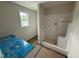 Bathroom with a new walk-in shower, vanity, and bright natural light at 82 W Emily Gardens Dr, Selma, NC 27576