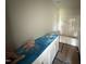 Bright bathroom featuring a vanity and bathtub with tiled walls at 82 W Emily Gardens Dr, Selma, NC 27576