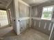 Unfinished bathroom area showing plumbing and a window providing natural light at 82 W Emily Gardens Dr, Selma, NC 27577