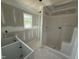 Unfinished bathroom features a shower and natural light at 82 W Emily Gardens Dr, Selma, NC 27577