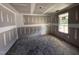 Unfinished bedroom showcasing natural light streaming through a window at 82 W Emily Gardens Dr, Selma, NC 27577