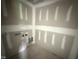 Functional laundry room showcasing prepped walls and hookups, ready for appliances at 82 W Emily Gardens Dr, Selma, NC 27577