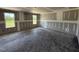 Unfinished living room with two windows providing ample natural light and an open floor plan at 82 W Emily Gardens Dr, Selma, NC 27577