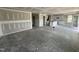 Large unfinished living room adjoining kitchen, ready for customization and finishing at 82 W Emily Gardens Dr, Selma, NC 27577