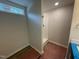 Compact bathroom with a window, new shower stall, neutral paint, new flooring, and modern fixtures at 83 W Emily Gardens Dr, Selma, NC 27576