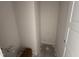 Unfinished bathroom with a toilet flange, water lines, and a doorway at 83 W Emily Gardens Dr, Selma, NC 27576