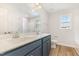 Bathroom featuring double sinks, modern vanity, and excellent lighting at 83 W Emily Gardens Dr, Selma, NC 27576