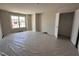 Spacious primary bedroom with a walk-in closet and abundant natural light at 83 W Emily Gardens Dr, Selma, NC 27576