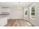 Bright dining area with ample natural light and modern chandelier at 83 W Emily Gardens Dr, Selma, NC 27576