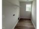 Utility room or laundry area with space for appliances and a wire rack shelf at 83 W Emily Gardens Dr, Selma, NC 27576