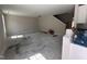 Open-concept living space with stairs leading to a second story at 83 W Emily Gardens Dr, Selma, NC 27576