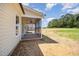This home has a screened porch, large windows, and a spacious backyard at 87 Tee Dr, Selma, NC 27576