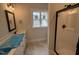 Bathroom features a glass-enclosed shower and granite countertops at 87 Tee Dr, Selma, NC 27576