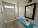 Hall bath with vanity and tub/shower combo at 87 Tee Dr, Selma, NC 27576