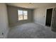 This bedroom offers natural light and a view of the outdoors through the window at 89 W Emily Gardens Dr, Selma, NC 27576