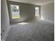 Unfinished bedroom featuring white walls and large, bright windows at 89 W Emily Gardens Dr, Selma, NC 27576