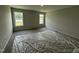 Bedroom with large windows offering plenty of natural light and a view at 89 W Emily Gardens Dr, Selma, NC 27576