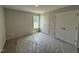 Bright bedroom with window view and double closets, offering ample storage at 89 W Emily Gardens Dr, Selma, NC 27576