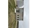 Modern home with a walkout patio, complemented by a spacious lawn and neutral siding at 9 W Emily Gardens Dr, Selma, NC 27576
