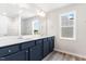A full bathroom featuring double sinks, modern vanity, and stylish fixtures at 9 W Emily Gardens Dr, Selma, NC 27576