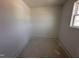 A clean, blank canvas bedroom with fresh paint and new trim ready for the new owner at 9 W Emily Gardens Dr, Selma, NC 27576