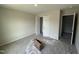 Well-lit bedroom with carpet, closet, and neutral walls ready for your personal touch at 9 W Emily Gardens Dr, Selma, NC 27576