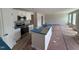 Modern kitchen featuring stainless steel appliances, an island with sink, and ample counter space at 9 W Emily Gardens Dr, Selma, NC 27576