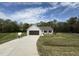 Charming single-story home with a well-manicured lawn and a two-car garage at 91 Harvest Hills Ln, Dunn, NC 28334