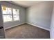 Bedroom with carpeting, a window and neutral colored walls at 98 Laramie Ln, Selma, NC 27576