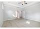 The main bedroom features plush carpet flooring, recessed lighting, and neutral paint at 98 Laramie Ln, Selma, NC 27576