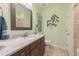 This bathroom includes a single vanity with modern fixtures, and a shower/tub combo at 1005 Vesper Ct, Durham, NC 27703