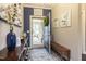 Stylish foyer with hardwood floors, elegant decor, and a view to the front porch at 1005 Vesper Ct, Durham, NC 27703