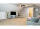 Spacious living room with TV and ceiling fan provides an inviting atmosphere at 1005 Vesper Ct, Durham, NC 27703